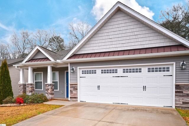 craftsman-style house with a porch and a garage