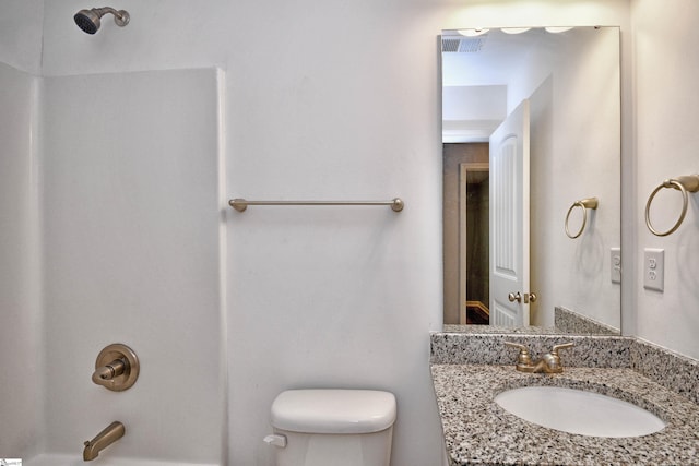 full bathroom featuring vanity, toilet, and shower / washtub combination