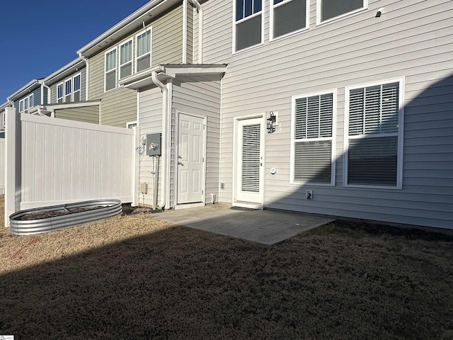 back of house featuring a patio area