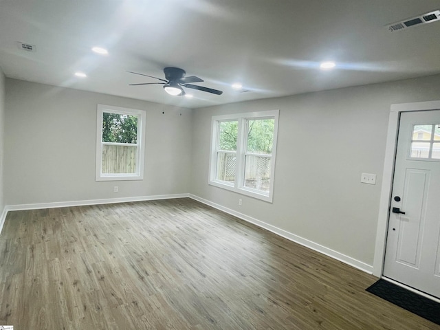 foyer with ceiling fan and hardwood / wood-style flooring