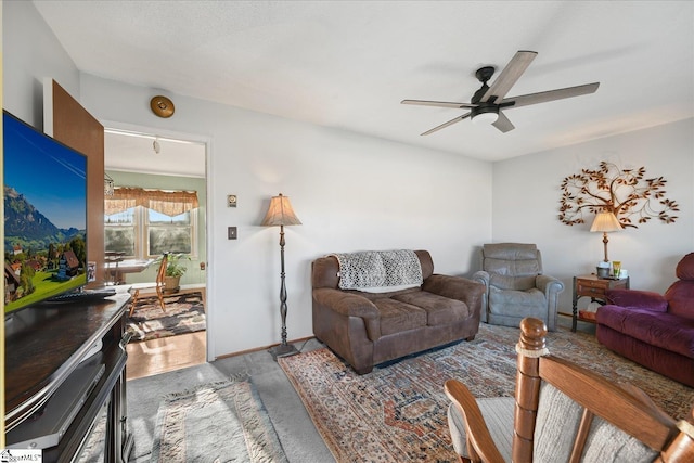 living room with ceiling fan