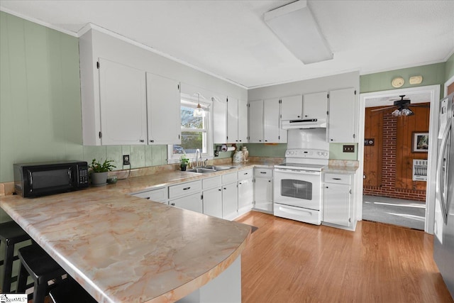 kitchen with white cabinetry, sink, ceiling fan, and white electric stove