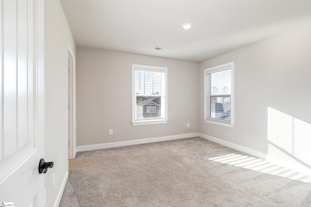 view of carpeted spare room