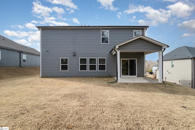 back of house featuring a patio area