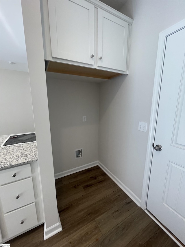 laundry room featuring dark hardwood / wood-style flooring