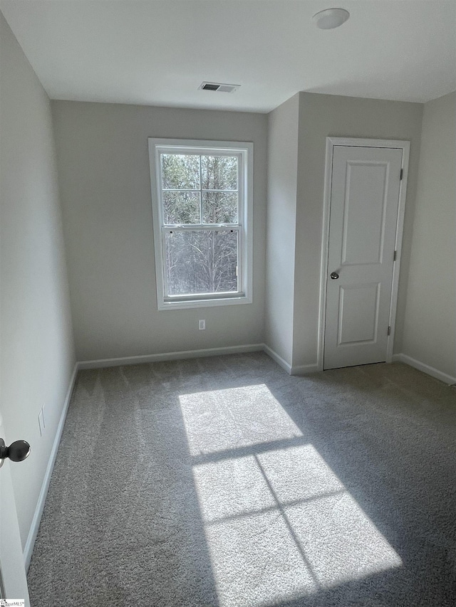 view of carpeted spare room