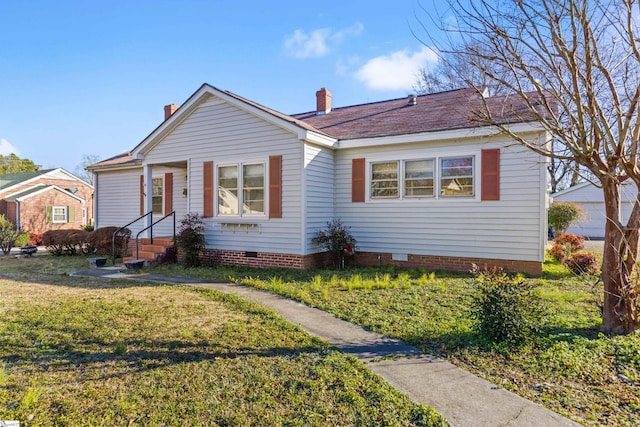 view of front of home featuring a front yard