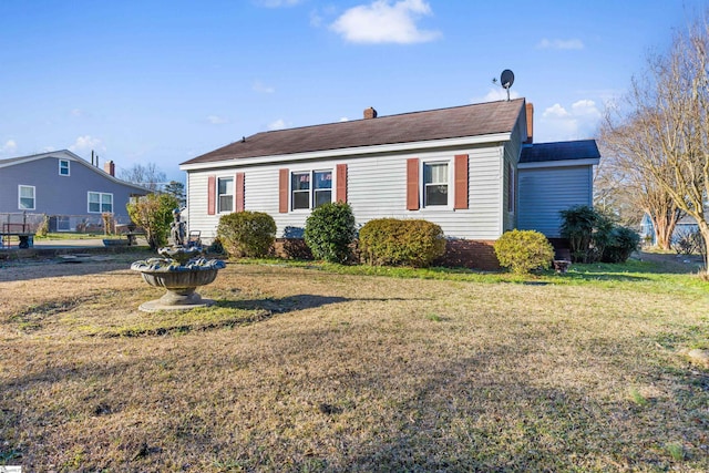 view of front of house with a front lawn