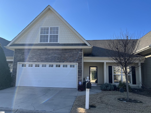 view of front of property featuring a porch and a garage