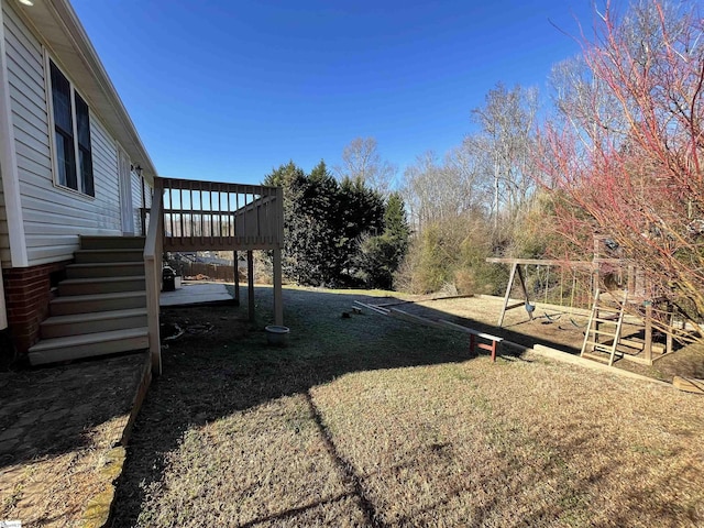 view of yard featuring a wooden deck