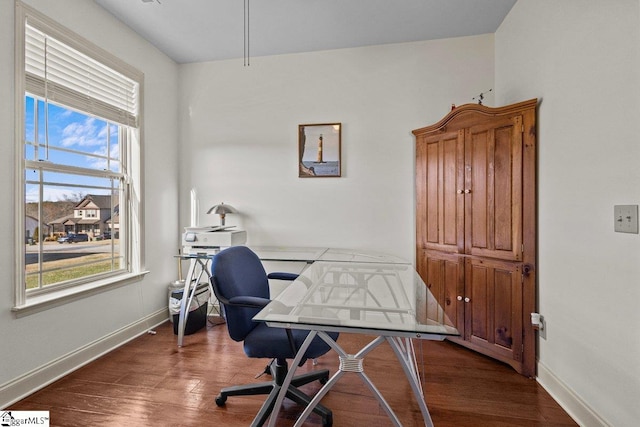 office space with dark hardwood / wood-style floors