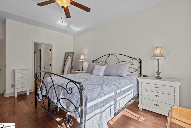 bedroom featuring hardwood / wood-style flooring and ceiling fan