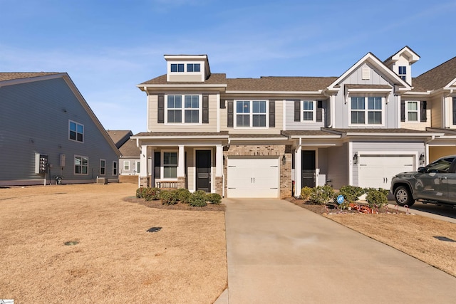 view of front of property with covered porch and a garage