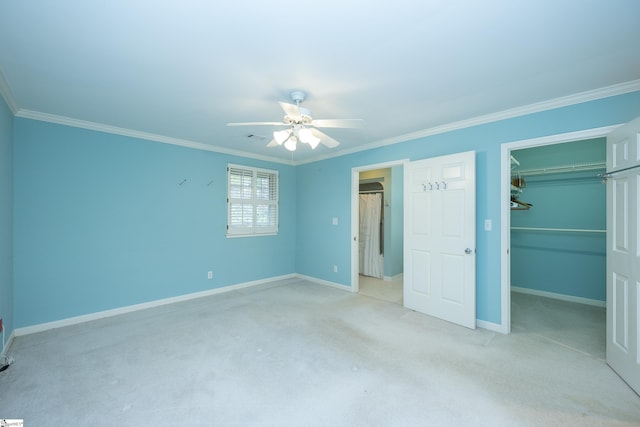 unfurnished bedroom featuring a closet, ceiling fan, and crown molding