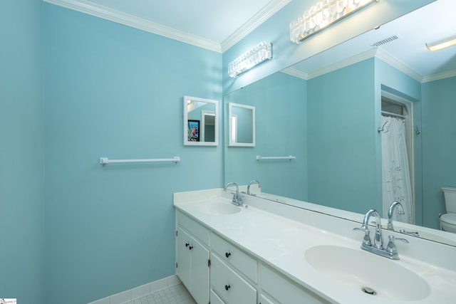 bathroom featuring tile patterned floors, vanity, toilet, and ornamental molding