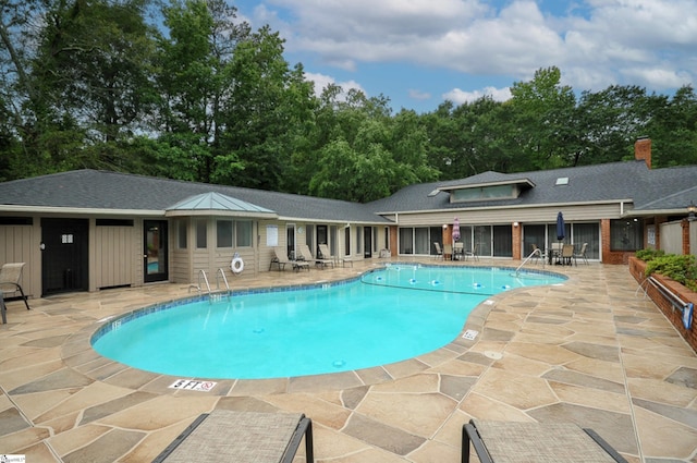 view of pool with a patio