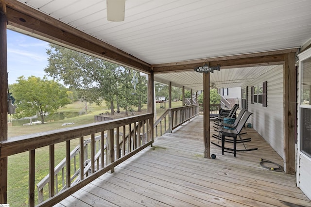 deck featuring a water view