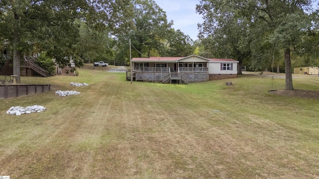 view of yard with covered porch