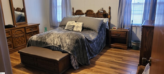 bedroom featuring dark hardwood / wood-style floors