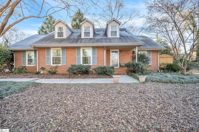 view of new england style home