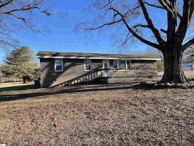 view of front of property featuring a deck