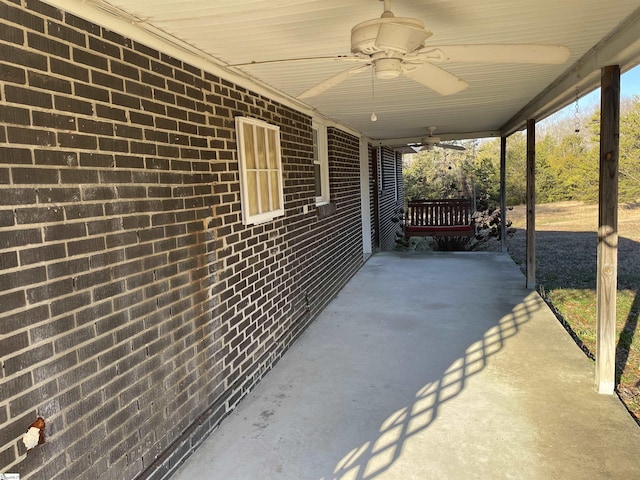 view of patio with ceiling fan