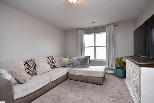 living room featuring light carpet