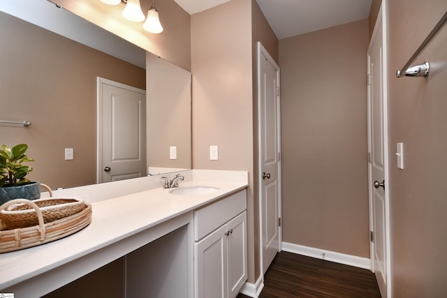 bathroom featuring vanity and wood-type flooring