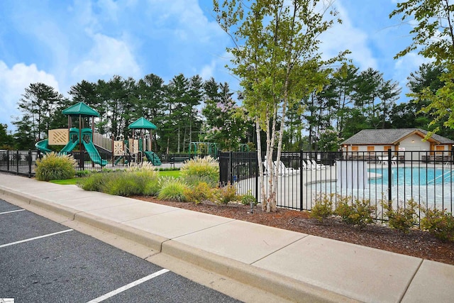 view of play area with a community pool