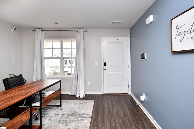 office area featuring dark wood-type flooring