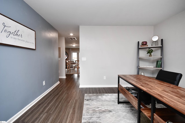 office space featuring dark hardwood / wood-style flooring