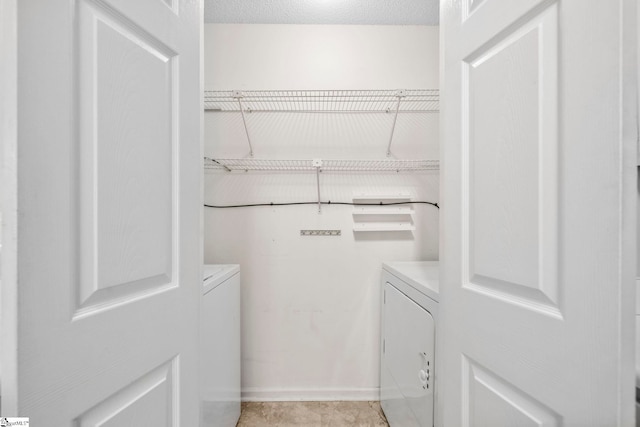 spacious closet with independent washer and dryer