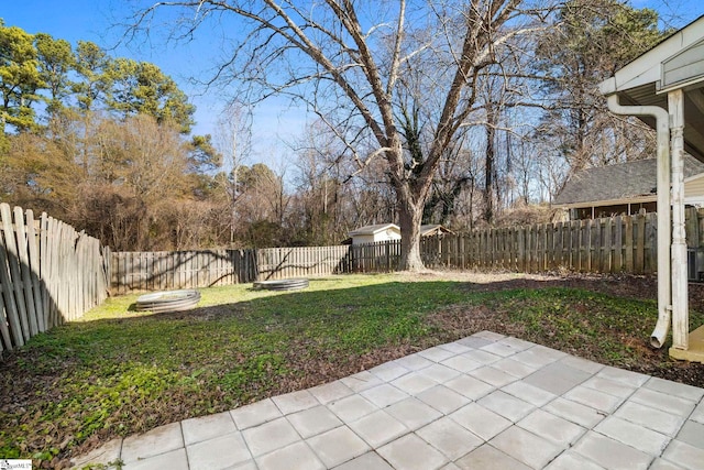 view of yard with a patio area