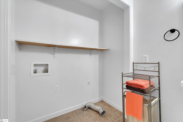 clothes washing area featuring hookup for an electric dryer and hookup for a washing machine