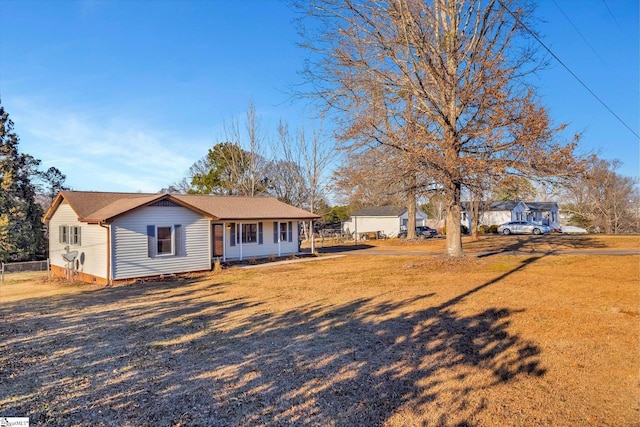 single story home with covered porch