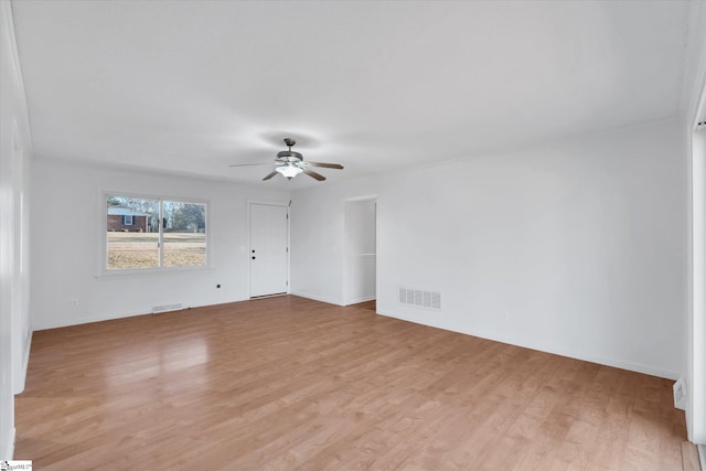 unfurnished room with ceiling fan and light hardwood / wood-style floors