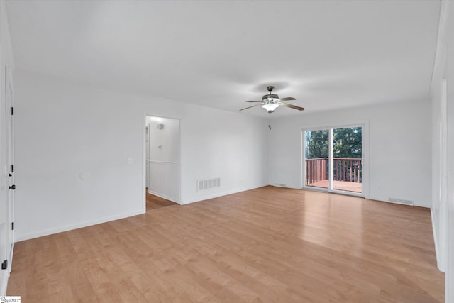 spare room featuring ceiling fan and light hardwood / wood-style flooring