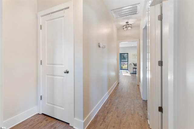 hall featuring light wood-type flooring