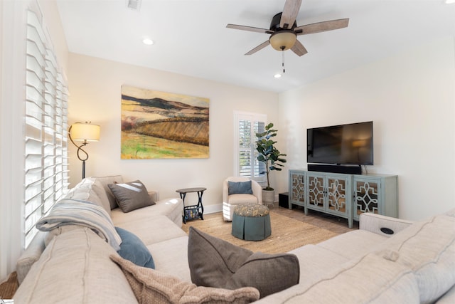 living room with ceiling fan