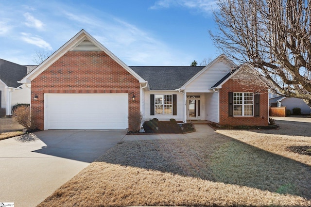 ranch-style house featuring a garage and a front lawn