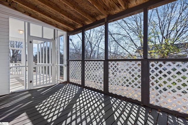 deck with a sunroom