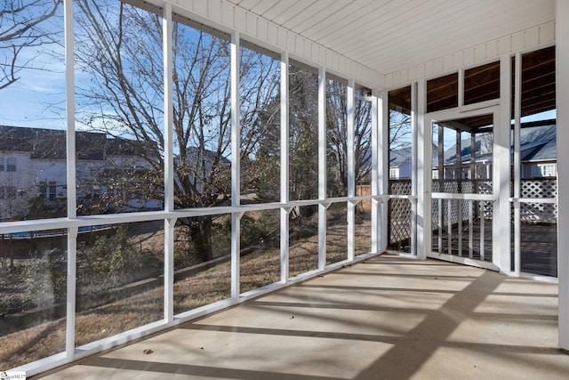 unfurnished sunroom with a healthy amount of sunlight