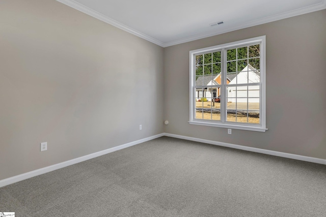 carpeted empty room with ornamental molding