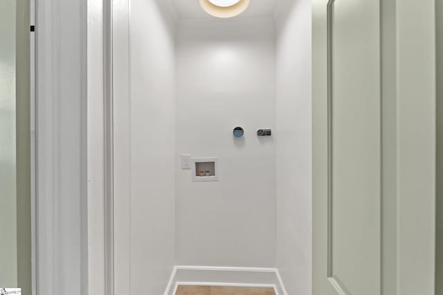 laundry area featuring washer hookup and tile patterned floors