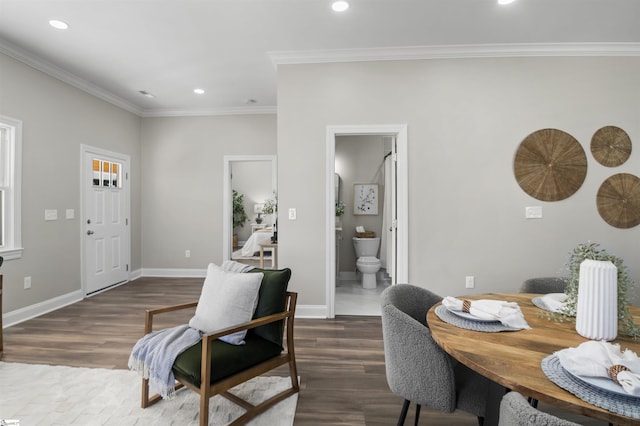 interior space featuring dark hardwood / wood-style floors and ornamental molding