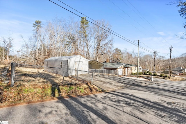 view of front of house with a carport