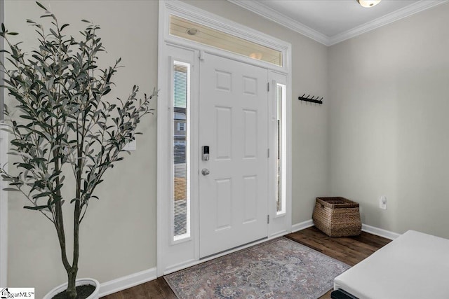 entryway with crown molding, a healthy amount of sunlight, and dark hardwood / wood-style floors