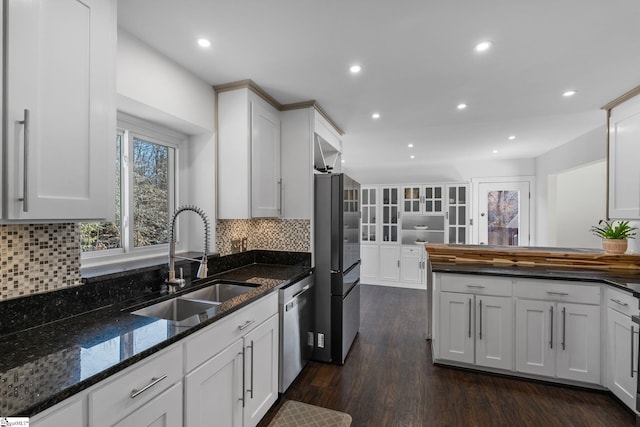 kitchen featuring white cabinetry, sink, and stainless steel appliances