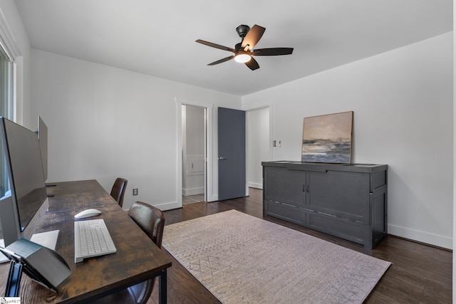 office space with ceiling fan and dark hardwood / wood-style flooring