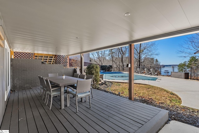 wooden terrace featuring a covered pool